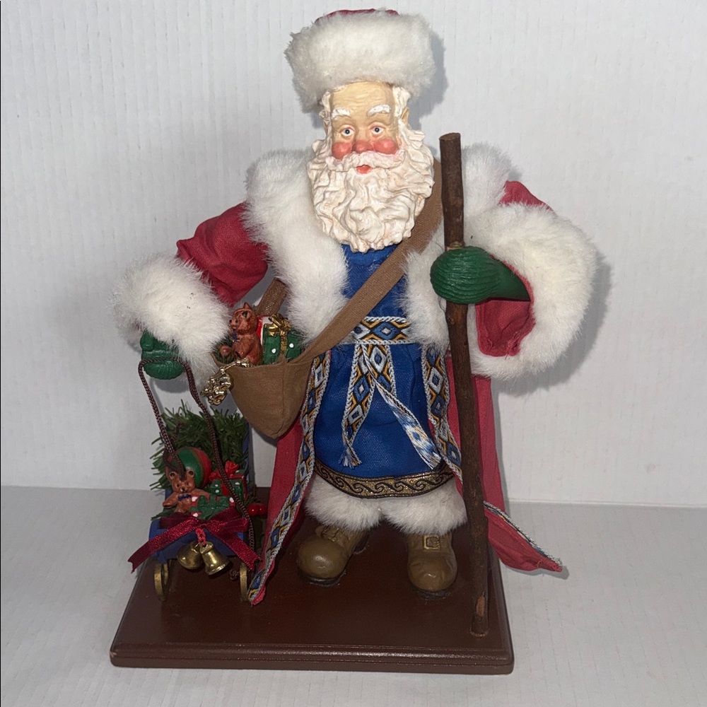 Festive Russian Santa Claus Figurine with Red and Blue Details